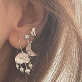 Stine A Petit silver splash earring disco heart