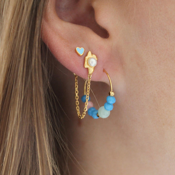 Stine A Shelly pearl earring with chain